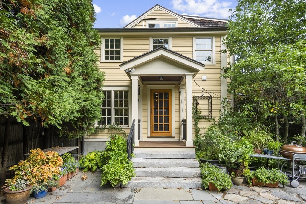 49 Parker Street Lexington, MA 02421 - Photo 33 of 42 a front view of a house with a yard and trees