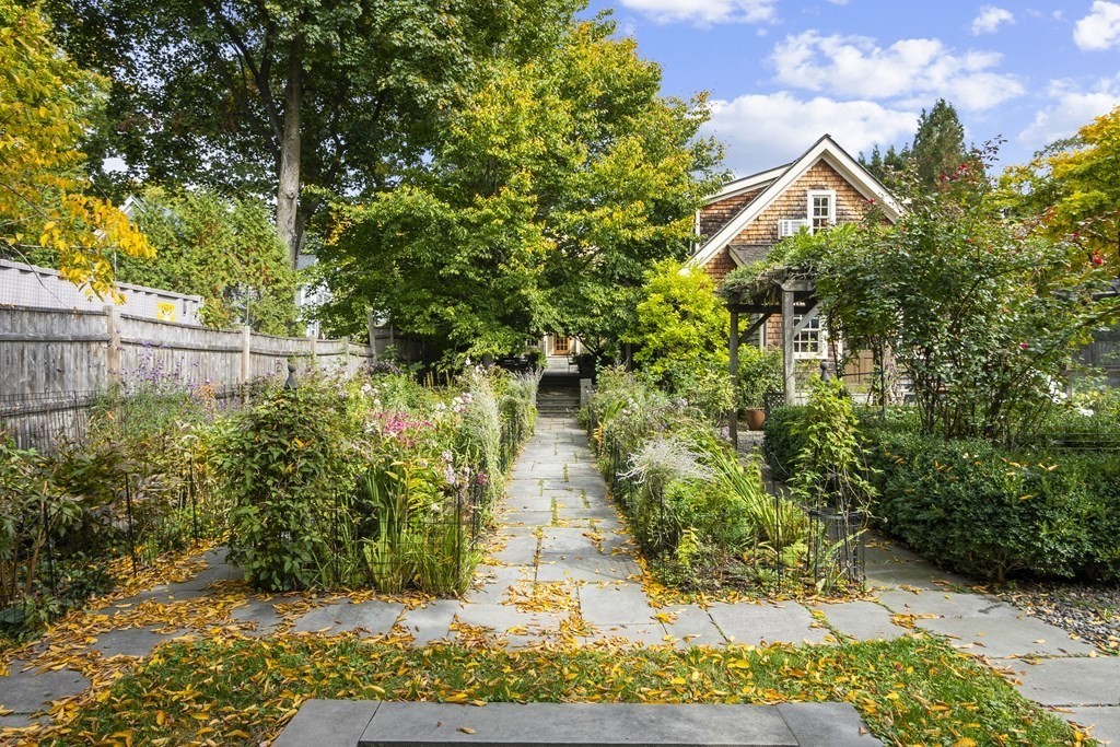 49 Parker Street Lexington, MA 02421 - Photo 36 of 42 a front view of a house with a yard