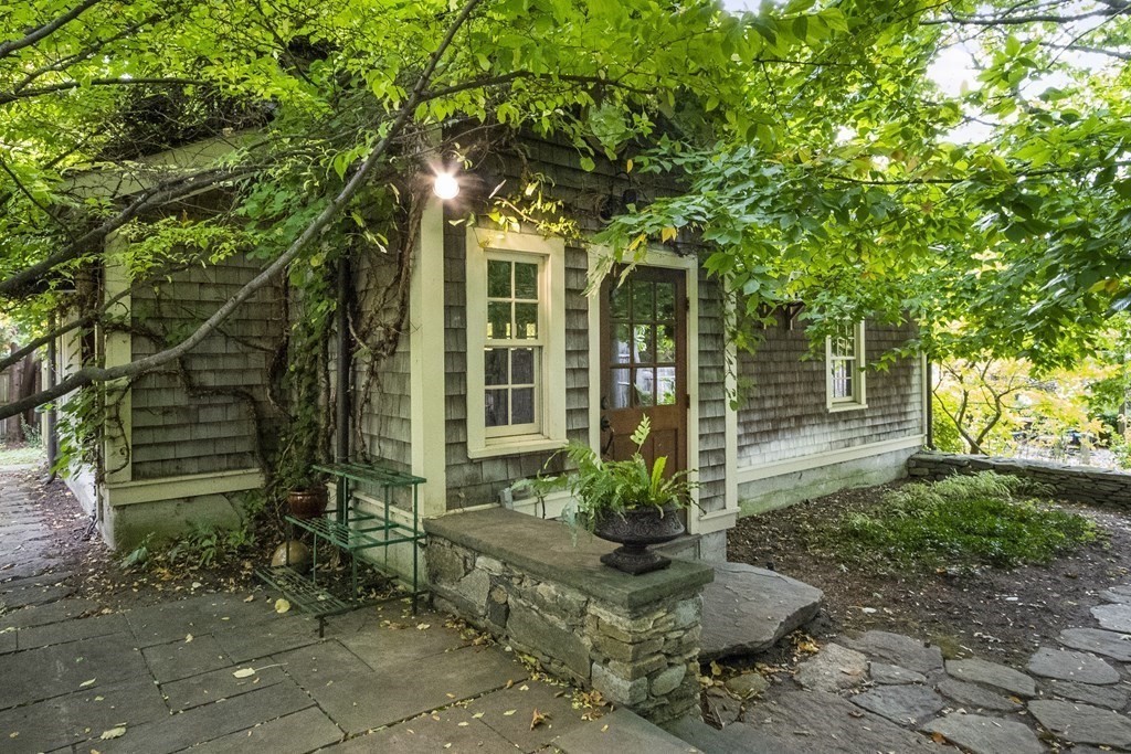 49 Parker Street Lexington, MA 02421 - Photo 38 of 42 a view of a house with a tree in front