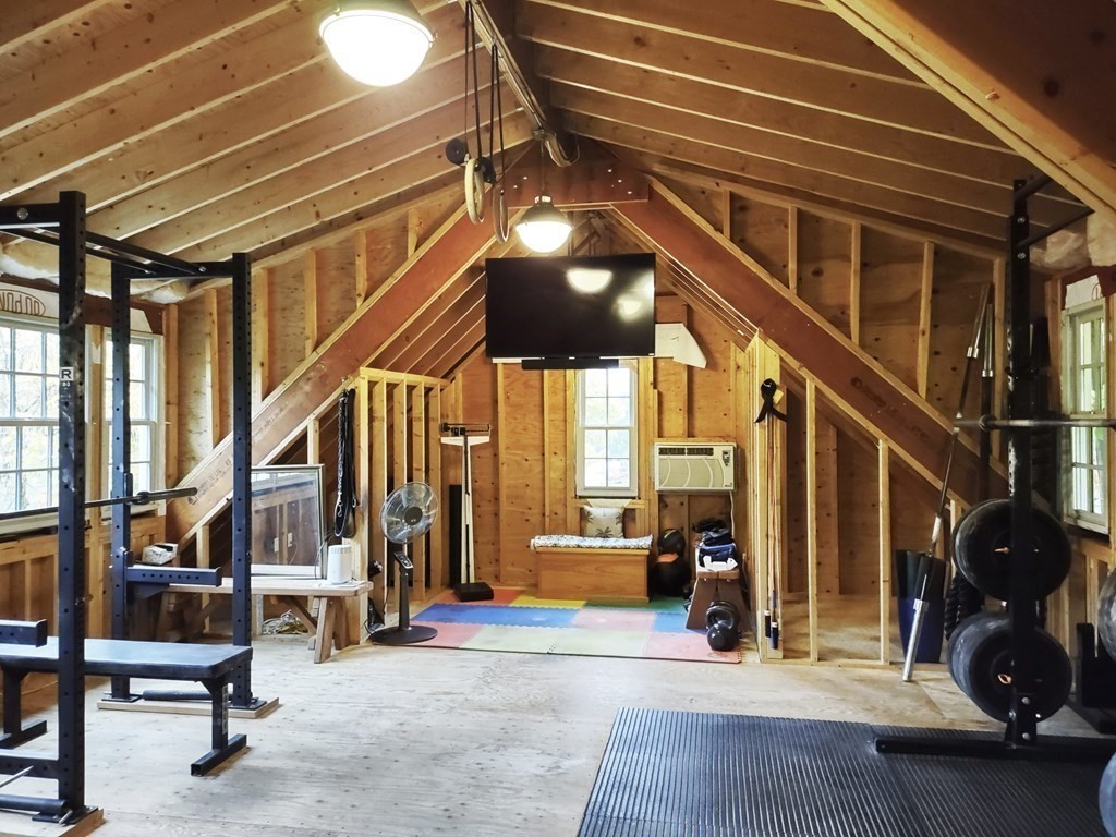 49 Parker Street Lexington, MA 02421 - Photo 40 of 42 a view of a room with gym equipment