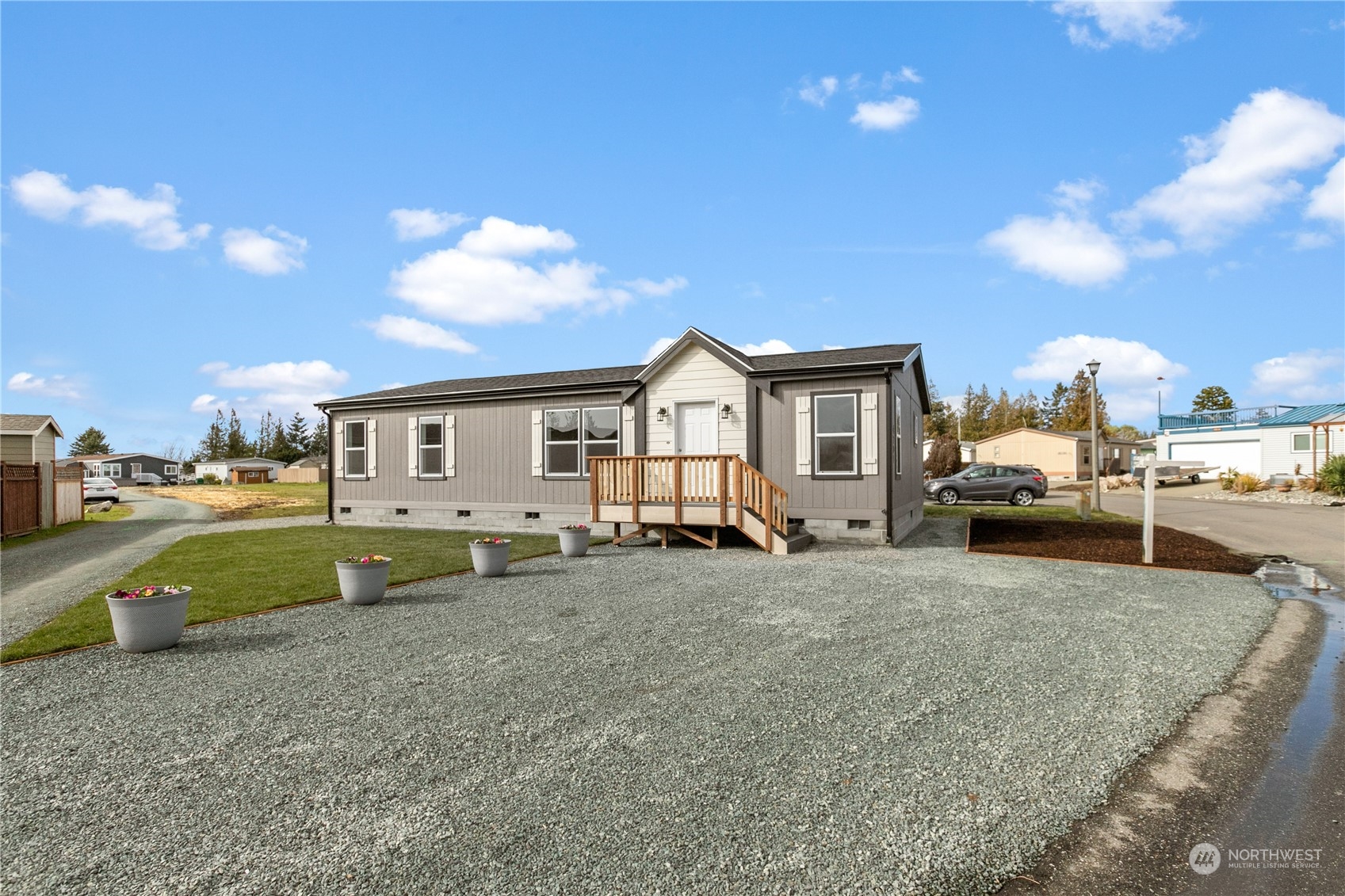 4701 Devonshire Drive Anacortes, WA 98221 - Photo 14 of 24 a view of a car park in front of house