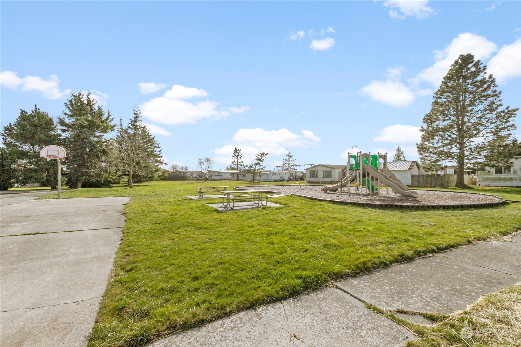 4701 Devonshire Drive Anacortes, WA 98221 - Photo 18 of 24 a view of a lake with a yard