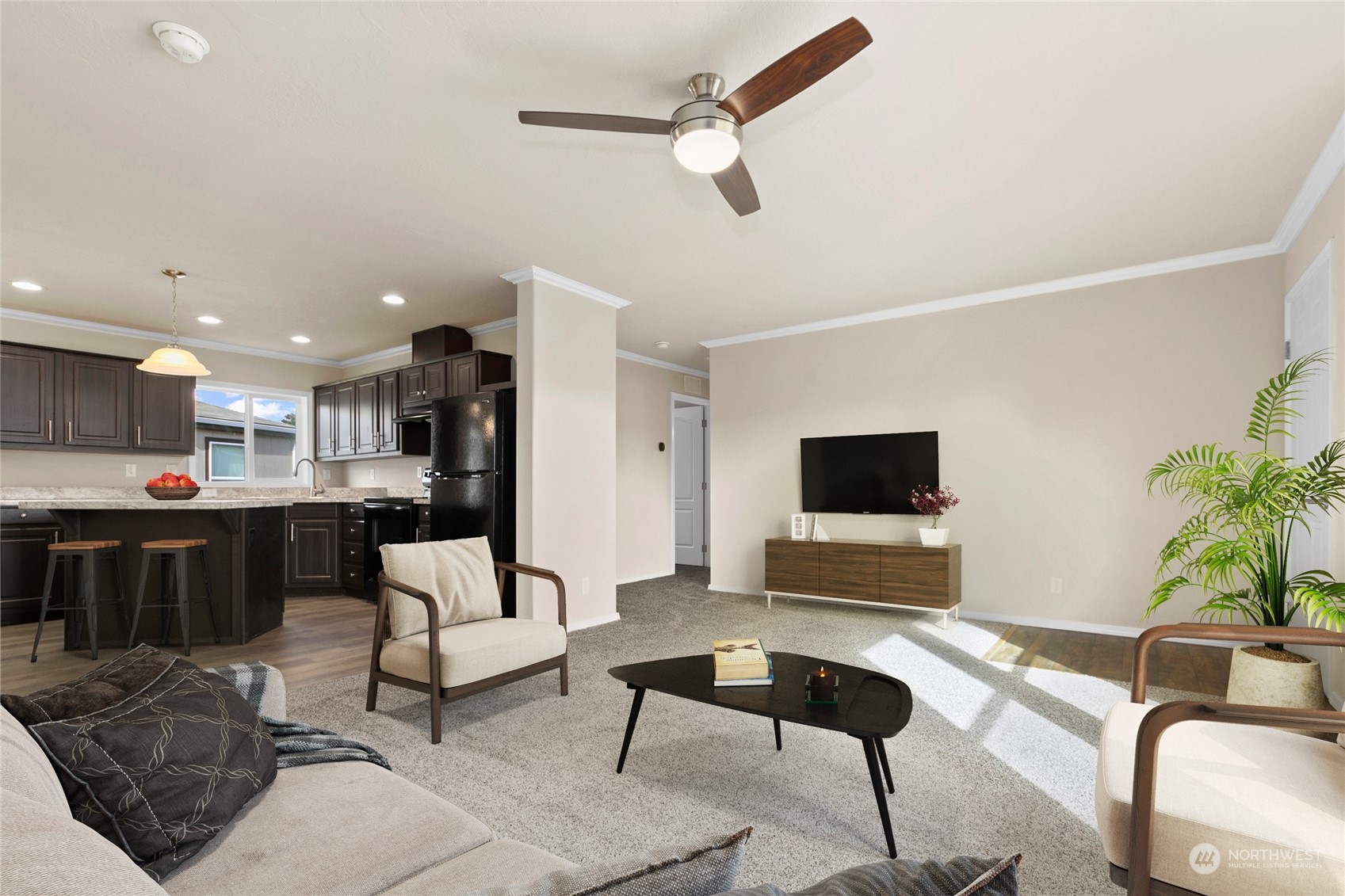 4701 Devonshire Drive Anacortes, WA 98221 - Photo 2 of 24 a living room with furniture and a flat screen tv