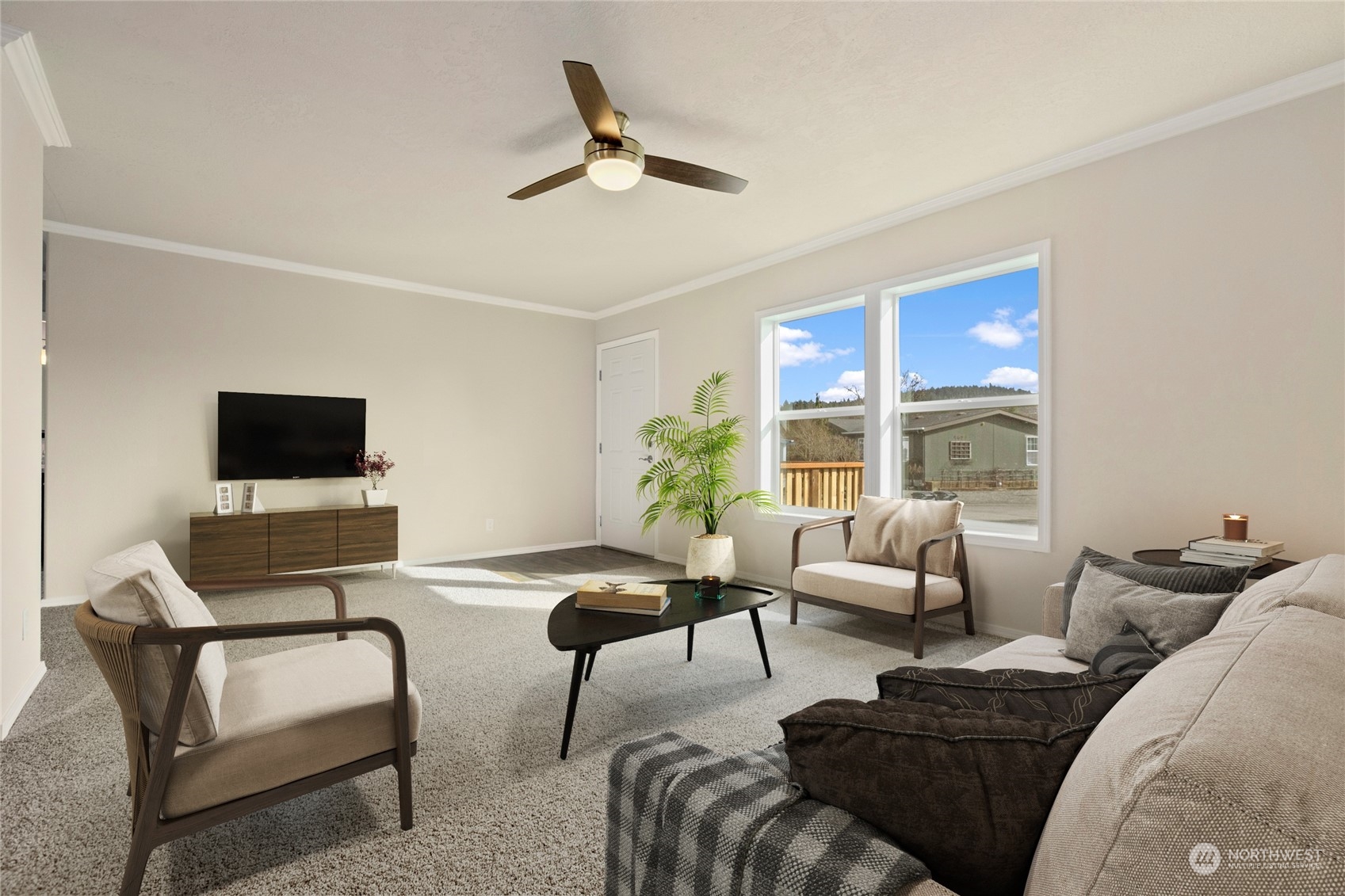 4701 Devonshire Drive Anacortes, WA 98221 - Photo 3 of 24 a living room with furniture and a flat screen tv