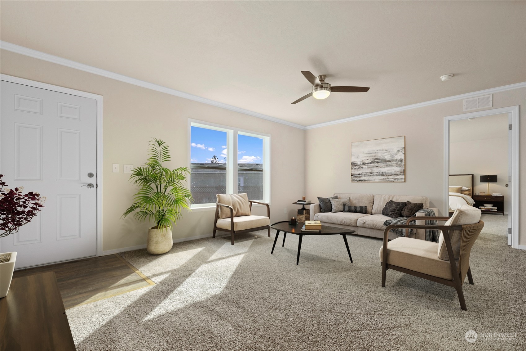 4701 Devonshire Drive Anacortes, WA 98221 - Photo 4 of 24 a living room with furniture potted plant and a window