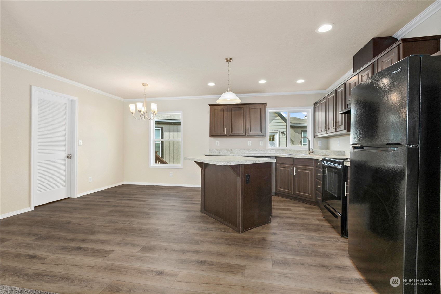 4701 Devonshire Drive Anacortes, WA 98221 - Photo 7 of 24 a kitchen with a refrigerator and a sink
