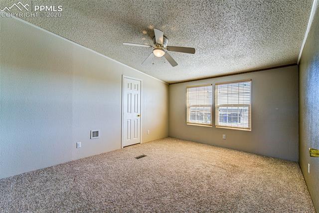 8050 Edison Road Yoder, CO 80864 - Photo 27 of 34 Bedroom #3. Door is to the closet