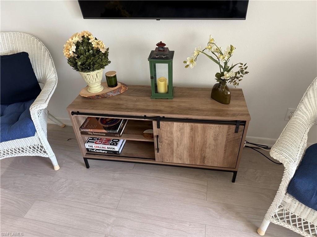 315 St Andrews Boulevard, Unit A2 Naples, FL 34113 - Photo 11 of 17 a close view of dining table