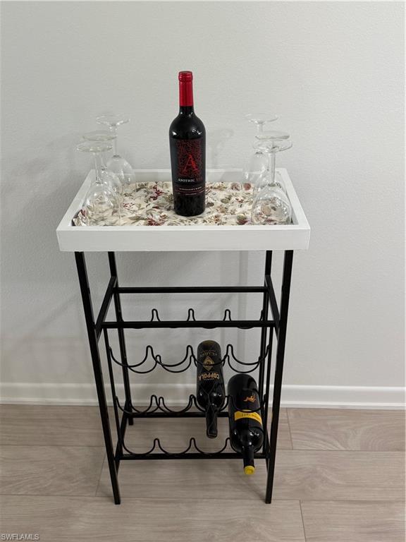 315 St Andrews Boulevard, Unit A2 Naples, FL 34113 - Photo 12 of 17 a close view of a table and chairs