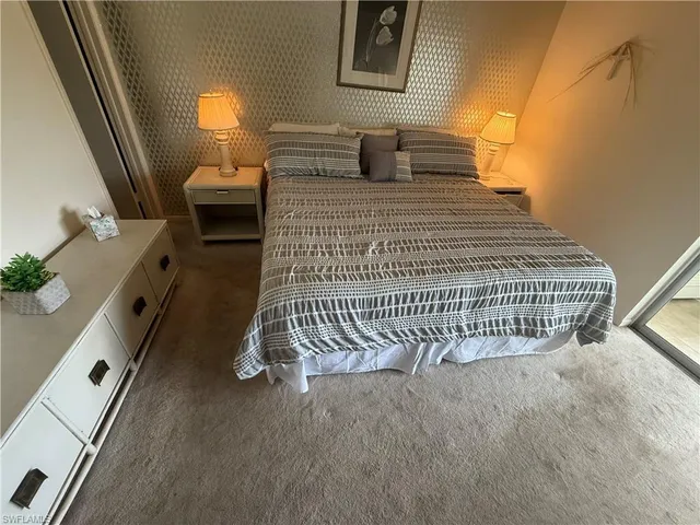 a view of staircase with wooden floor