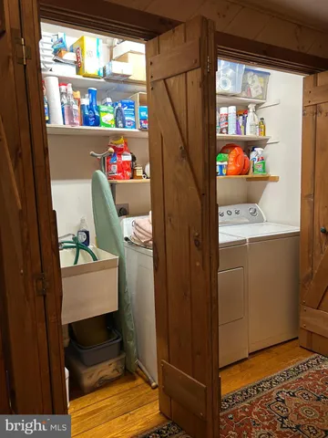 a front view of a building with outdoor seating