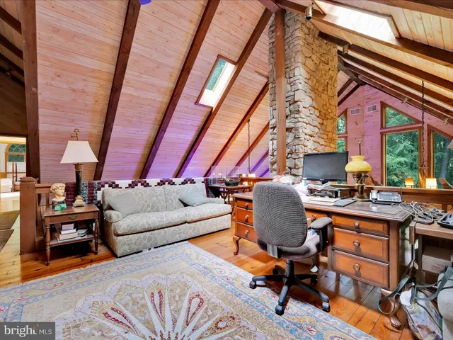 a deck with trees in front of it