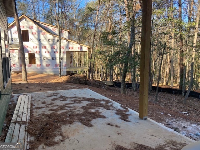 9 Tanvor Trail Cleveland, GA 30528 - Photo 25 of 37 a view of a yard with trees in the background