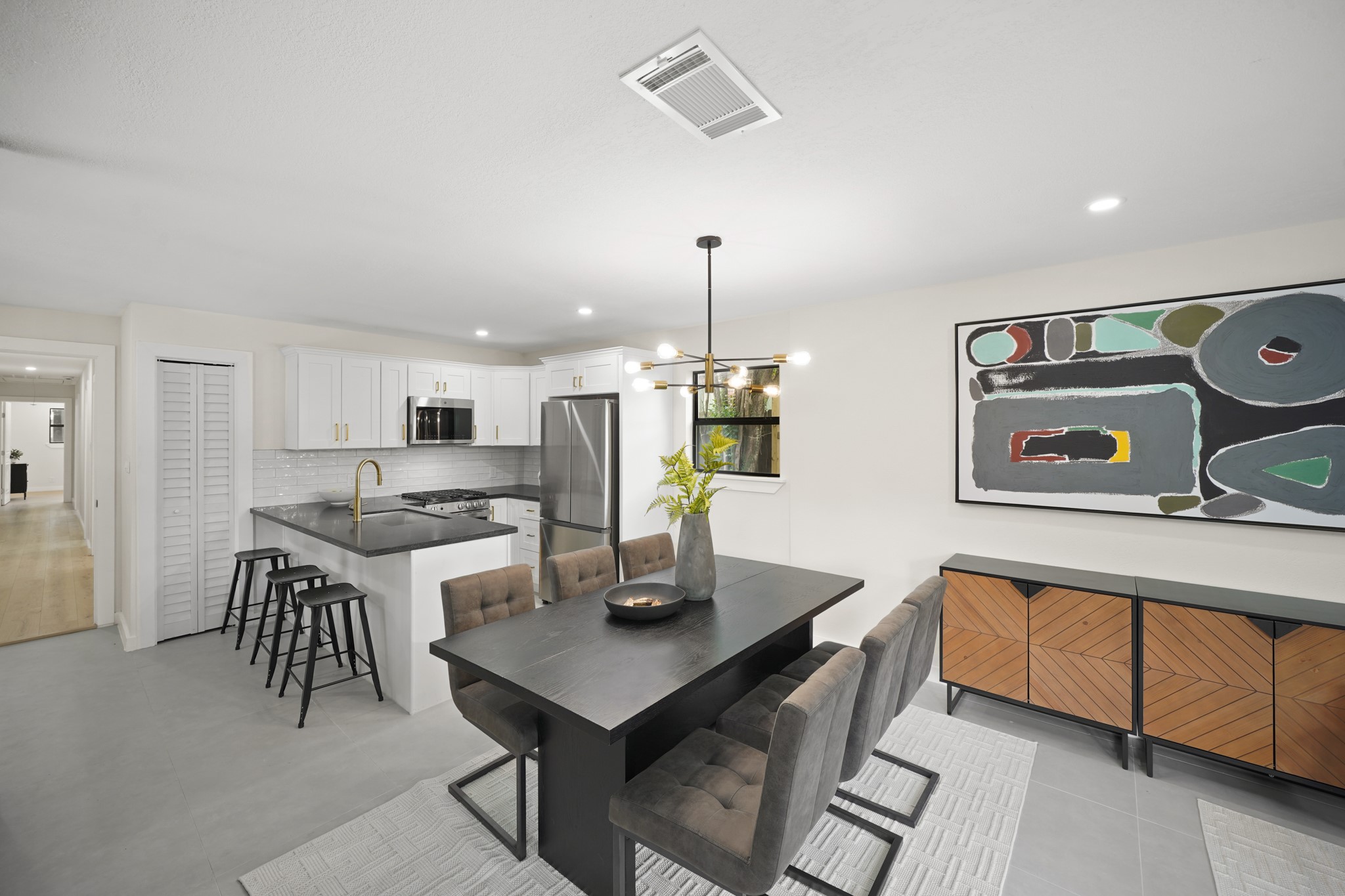 4813 Hummingbird Street Houston, TX 77035 - Photo 50 of 50 Serving Meals will be a Breeze, from the Kitchen to the Adjacent Dining Area---such a Functional Floorplan for all to Enjoy!