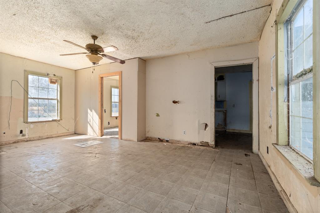 218 North Preston Street Whitney, TX 76692 - Photo 16 of 23 a view of an empty room with a window