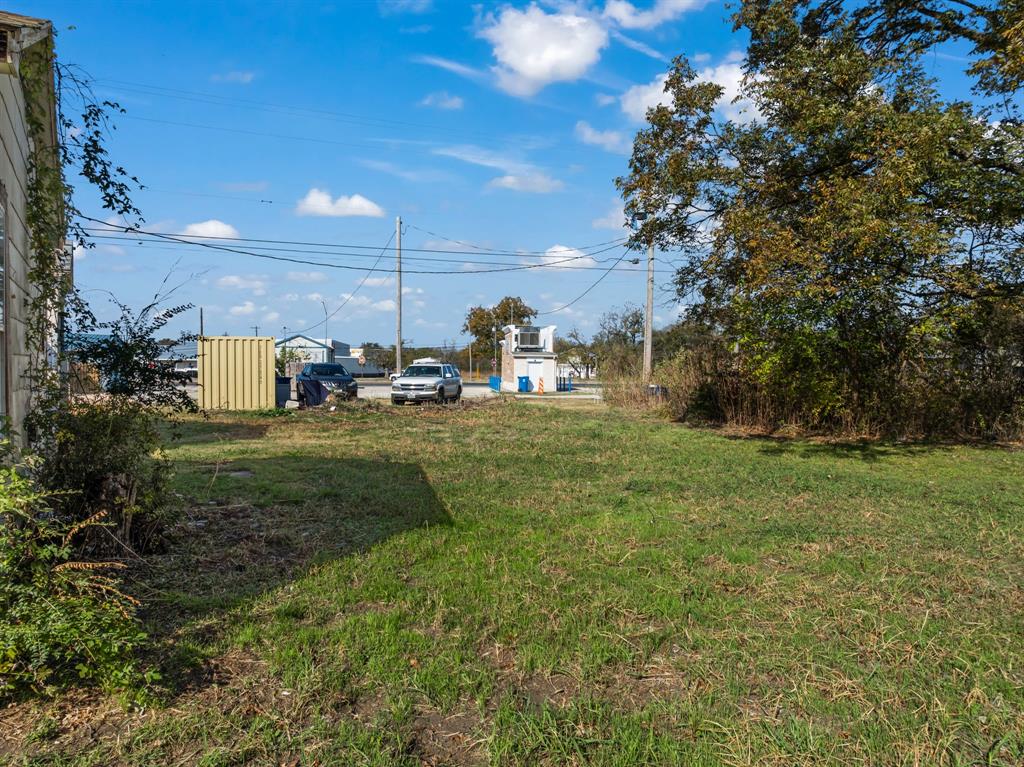 218 North Preston Street Whitney, TX 76692 - Photo 4 of 23 a view of a field with of trees