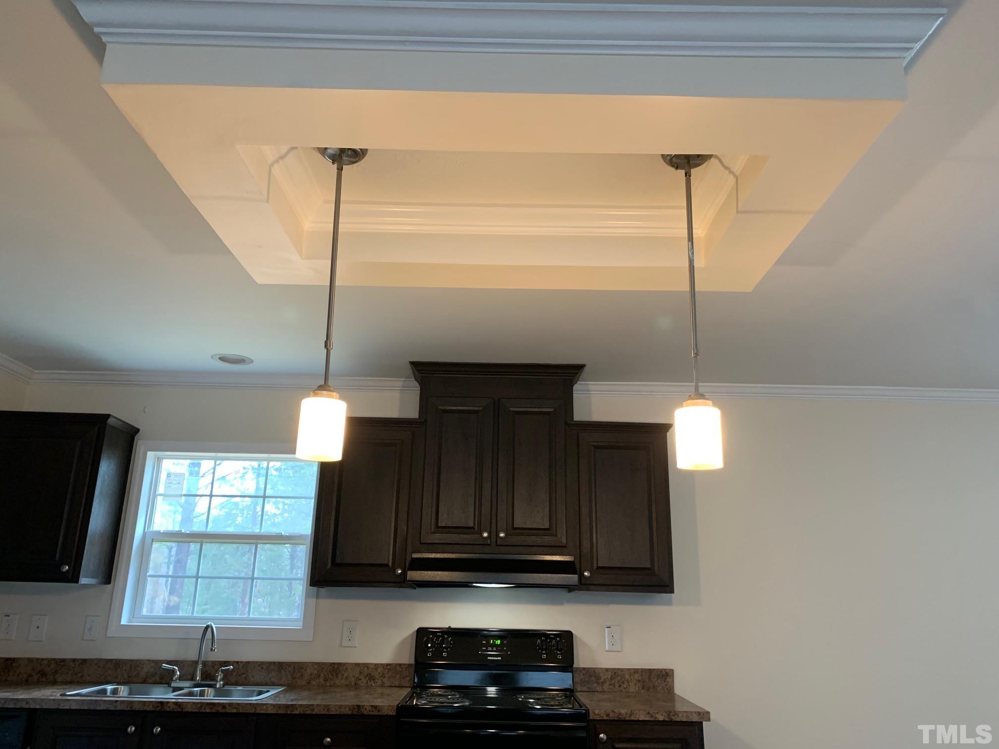 694 Stoney Mountain Road Rougemont, NC 27572 - Photo 5 of 23 a kitchen with a sink and a window