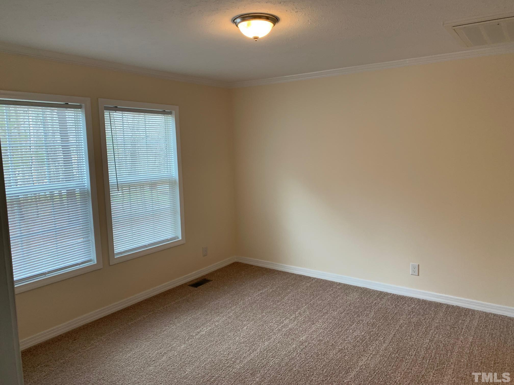 694 Stoney Mountain Road Rougemont, NC 27572 - Photo 8 of 23 an empty room with a window