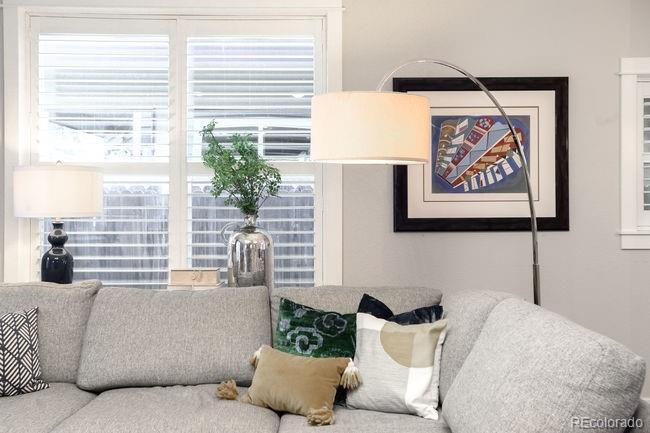 3604 Raleigh Street Denver, CO 80212 - Photo 16 of 38 a bedroom with a bed and a painting on the wall