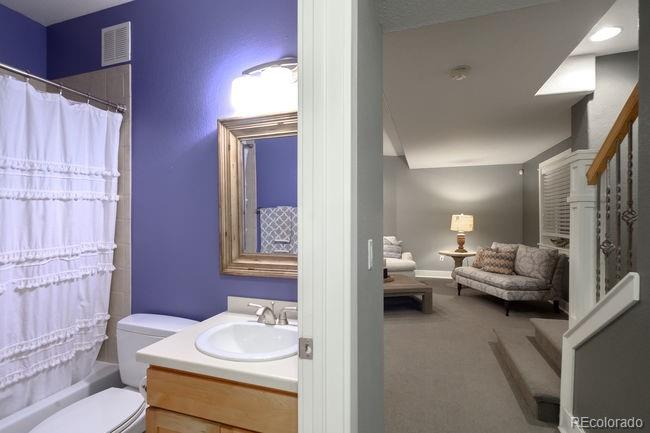 3604 Raleigh Street Denver, CO 80212 - Photo 27 of 38 a en suite bathroom with a sink double vanity and tub