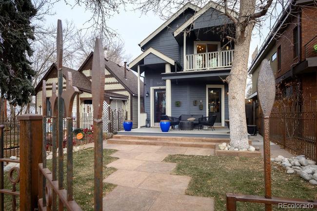 3604 Raleigh Street Denver, CO 80212 - Photo 4 of 38 a view of a building with car parked