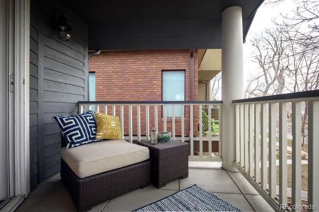 3604 Raleigh Street Denver, CO 80212 - Photo 7 of 38 a balcony with table and chairs