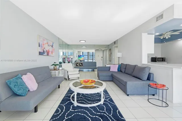 a living room with furniture and a couch