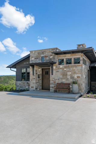 2192 East Outlaw Road Kamas, UT 84036 - Photo 77 of 80 Stone and wood-clad exterior with a prominent entry