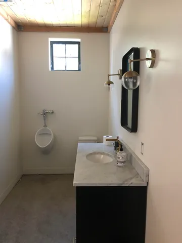 a view of a street with a tree