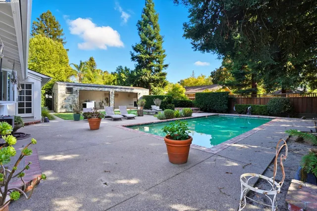 a garden view with a seating space