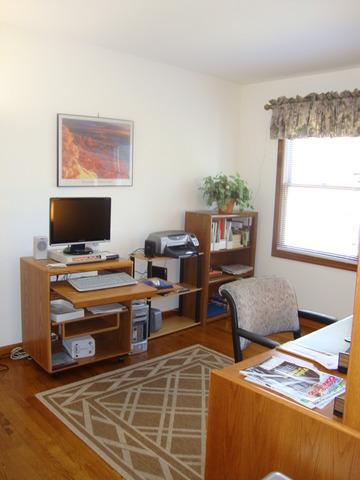 1234 Fagan Road Batavia, IL 60510 - Photo 13 of 25 a room with furniture and a flat screen tv