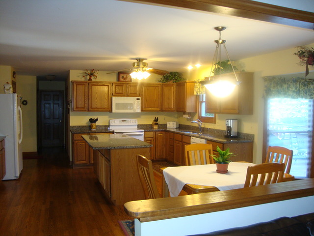 1234 Fagan Road Batavia, IL 60510 - Photo 15 of 25 a large kitchen with a table and chairs
