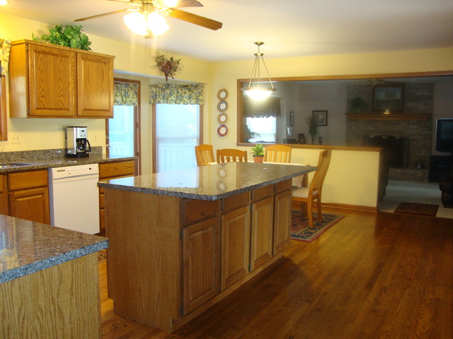 1234 Fagan Road Batavia, IL 60510 - Photo 23 of 25 a large kitchen with kitchen island a large counter top space and stainless steel appliances
