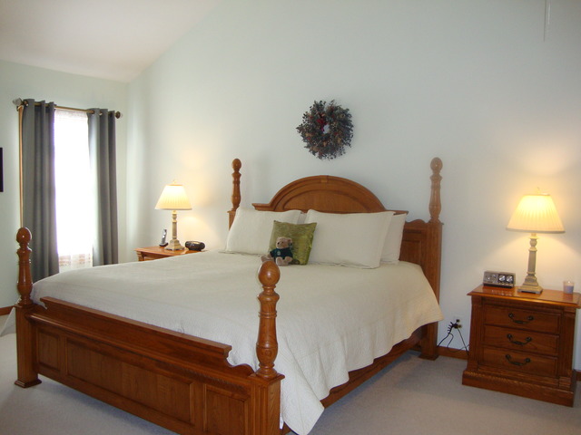 1234 Fagan Road Batavia, IL 60510 - Photo 5 of 25 a bedroom with a bed and a lamp on dresser