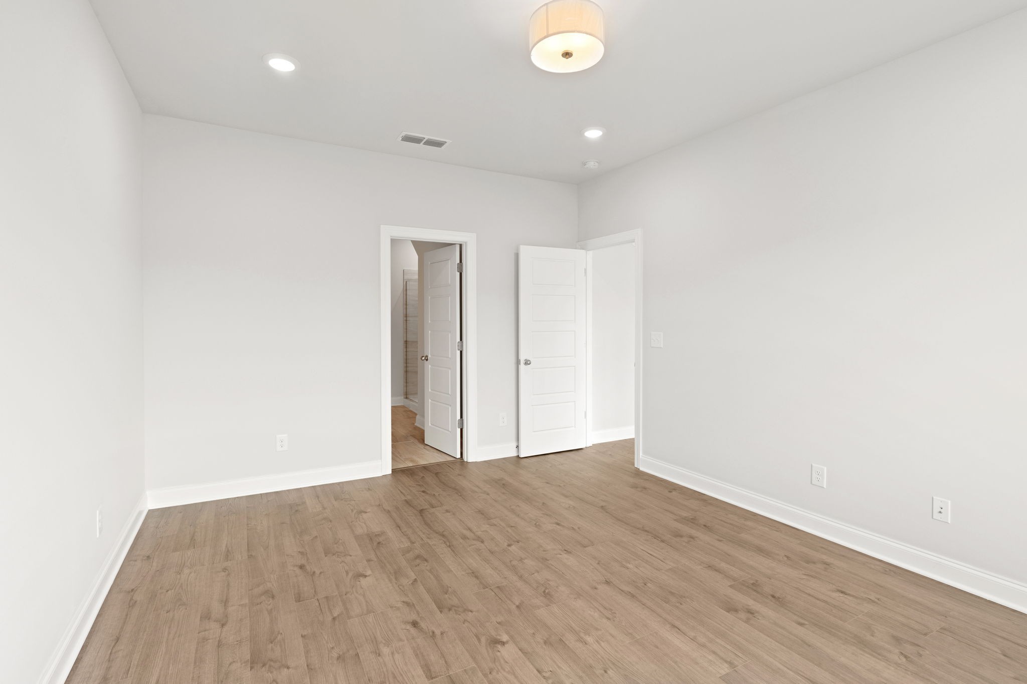 2420 Audubon Lane Murfreesboro, TN 37128 - Photo 15 of 37 an empty room with wooden floor and windows