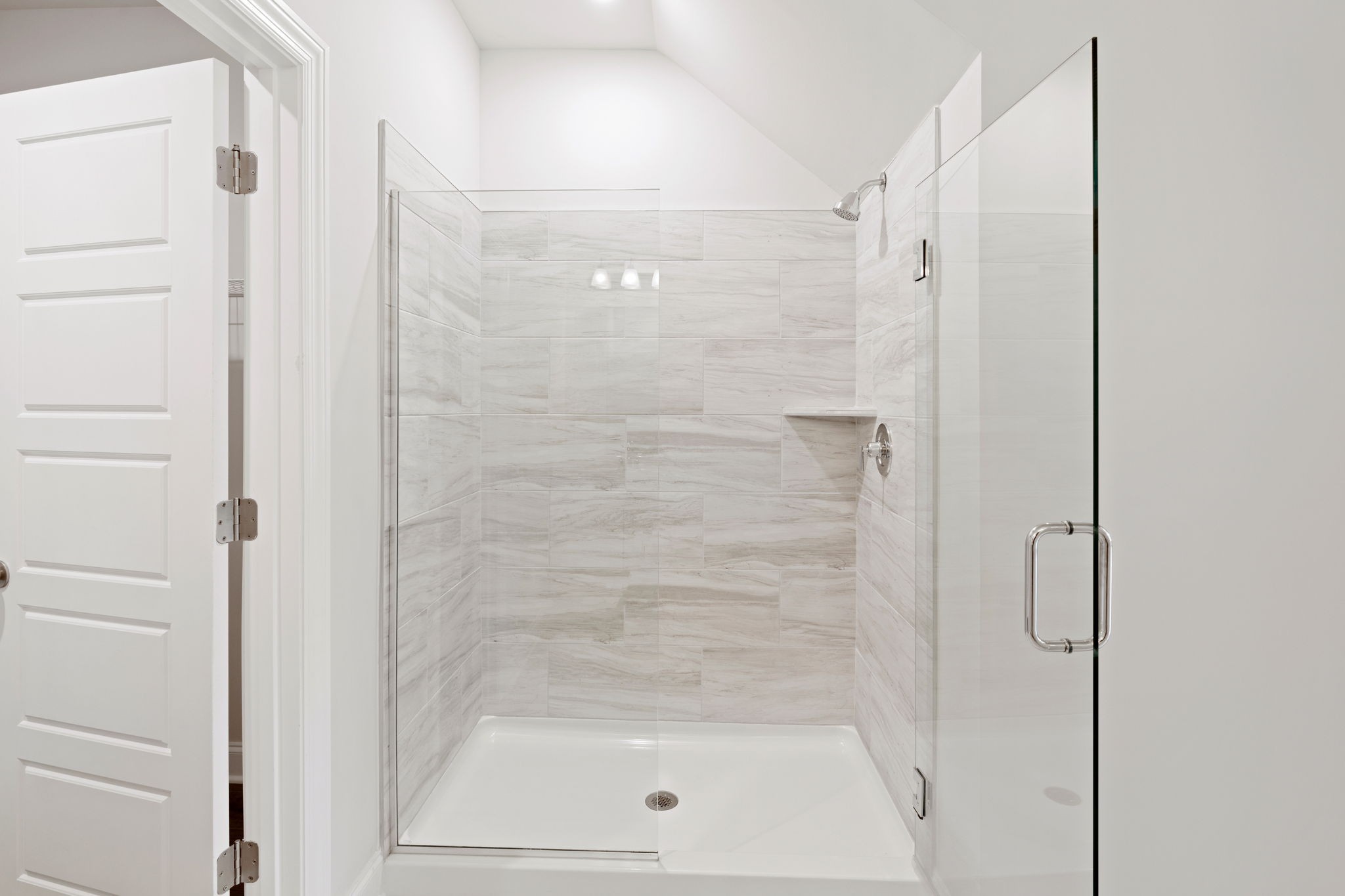 2420 Audubon Lane Murfreesboro, TN 37128 - Photo 18 of 37 a bathroom with a glass shower door