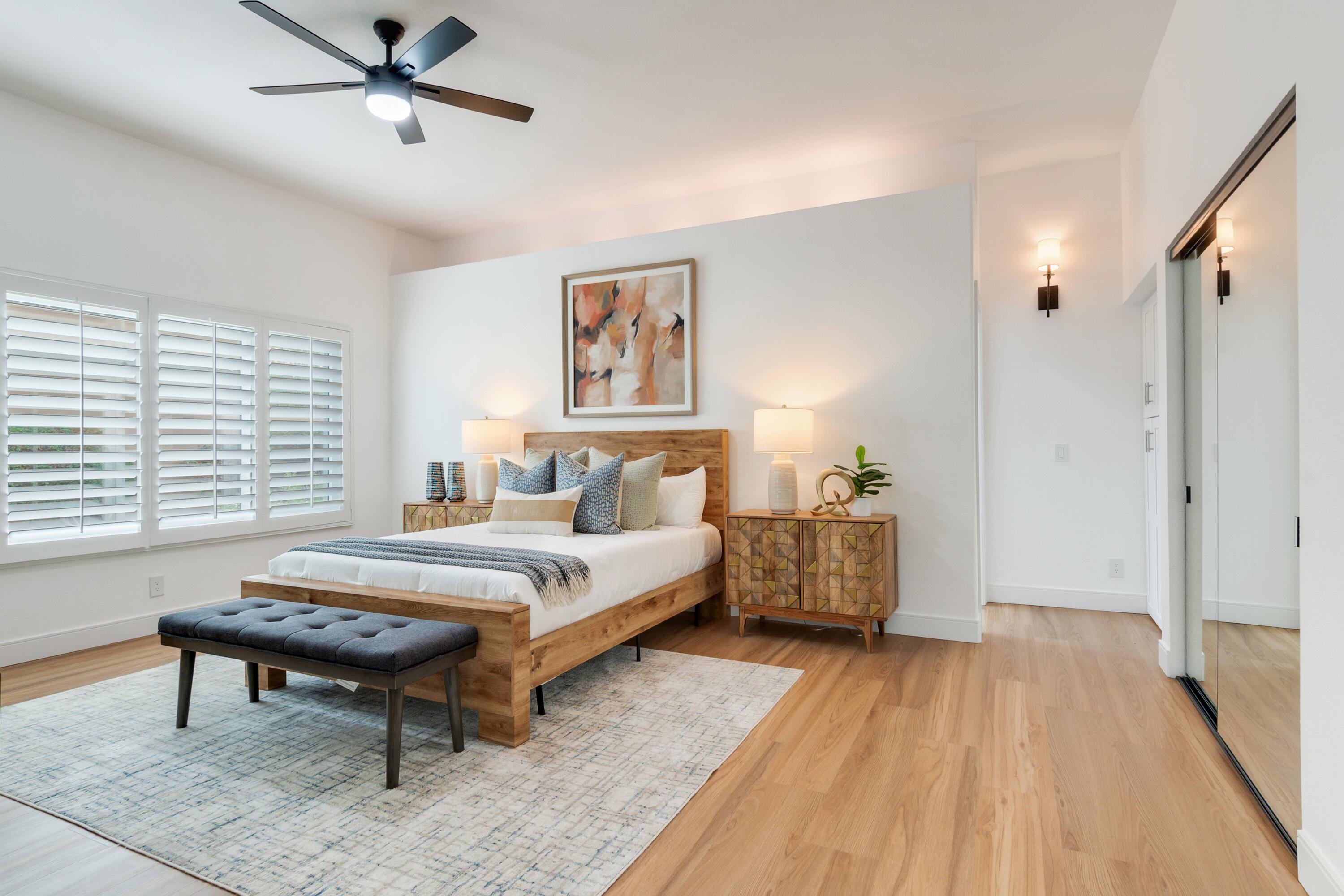 30 Hilton Head Drive Rancho Mirage, CA 92270 - Photo 13 of 33 a spacious bedroom with a bed and a table