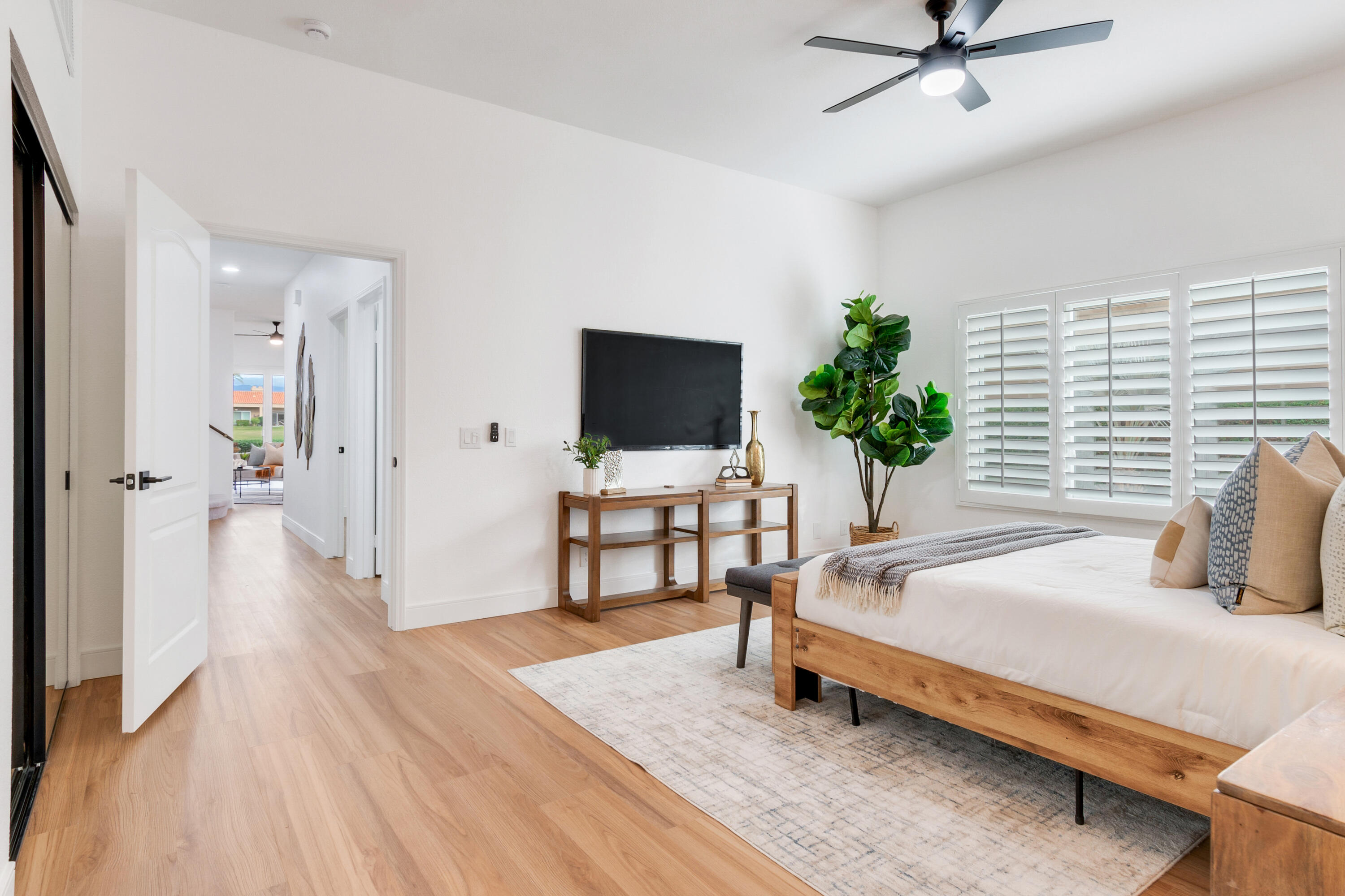 30 Hilton Head Drive Rancho Mirage, CA 92270 - Photo 14 of 33 a bedroom with a bed and a flat screen tv