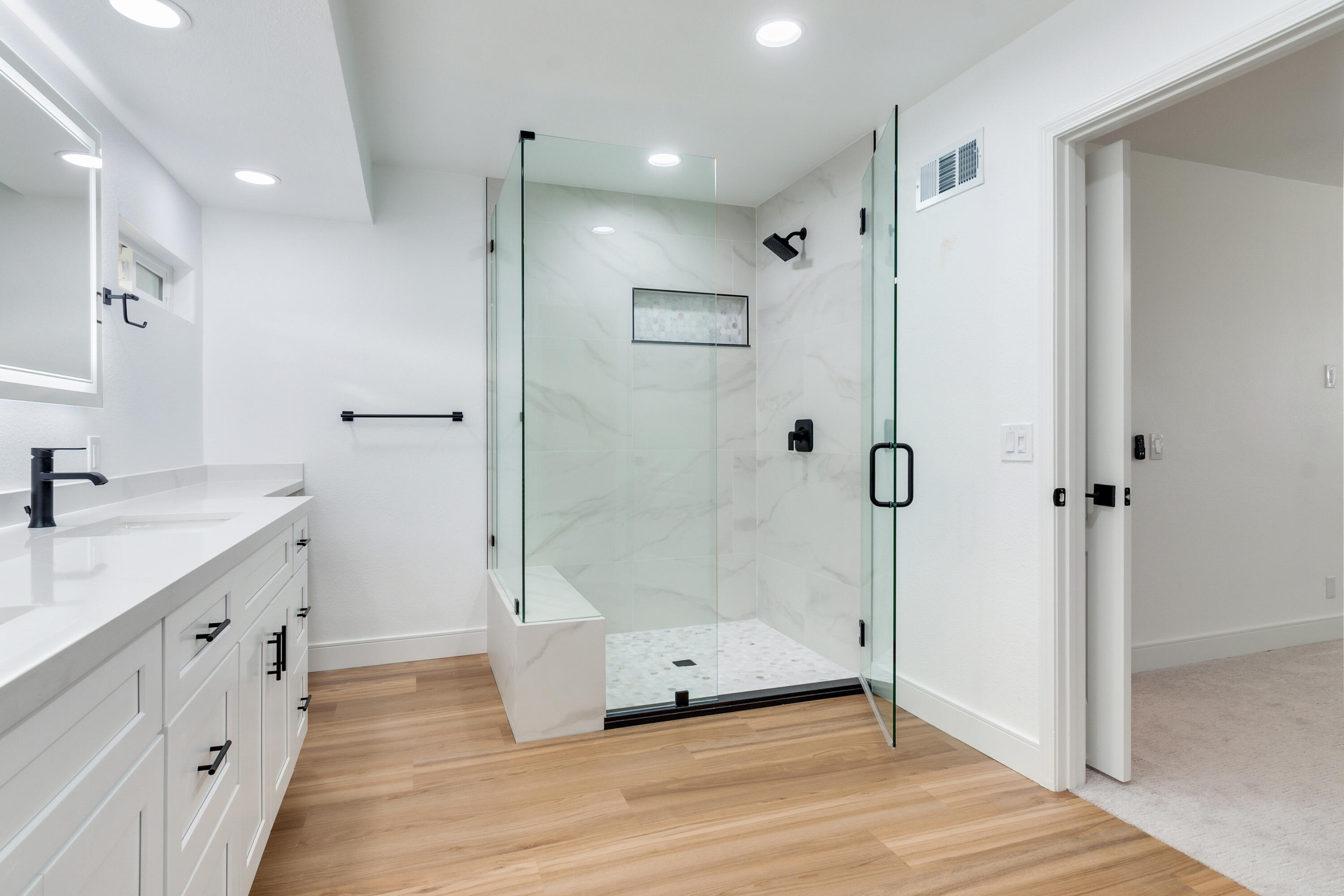 30 Hilton Head Drive Rancho Mirage, CA 92270 - Photo 20 of 33 a bathroom with a double vanity sink toilet and shower