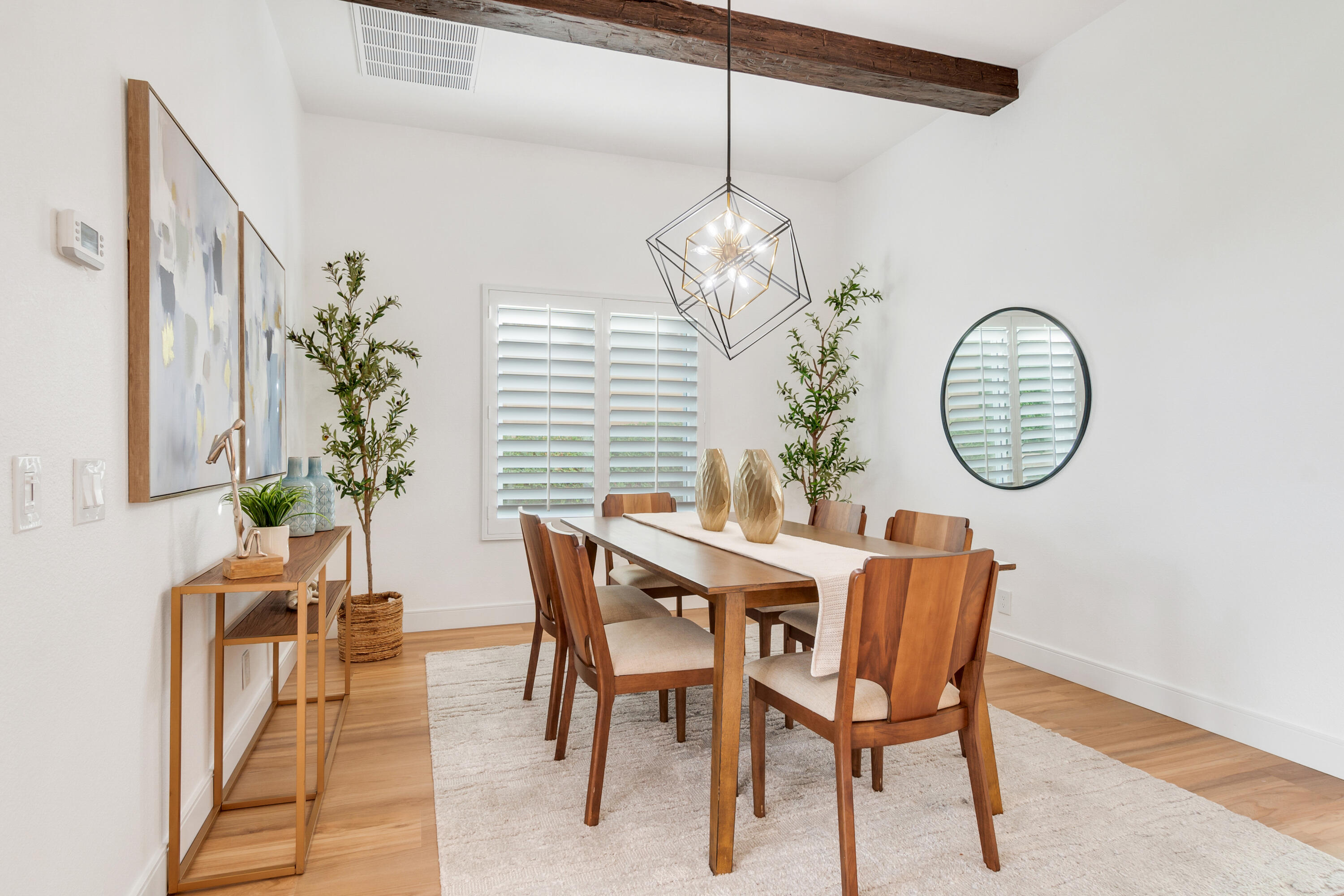 30 Hilton Head Drive Rancho Mirage, CA 92270 - Photo 2 of 33 a view of a dining room with furniture window and wooden floor