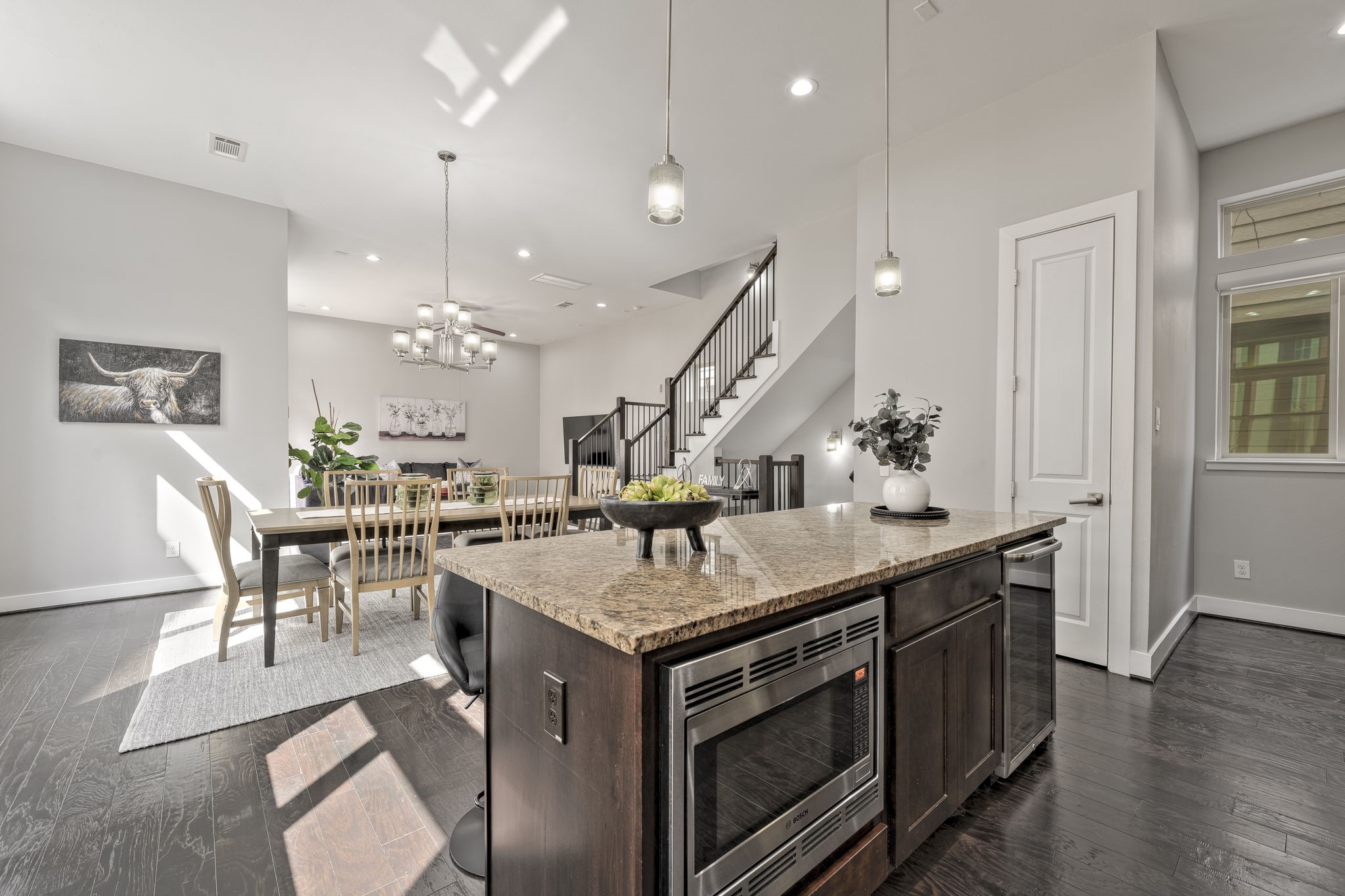 4408 Eli Street, Unit C Houston, TX 77007 - Photo 11 of 48 a kitchen with a stove and a table