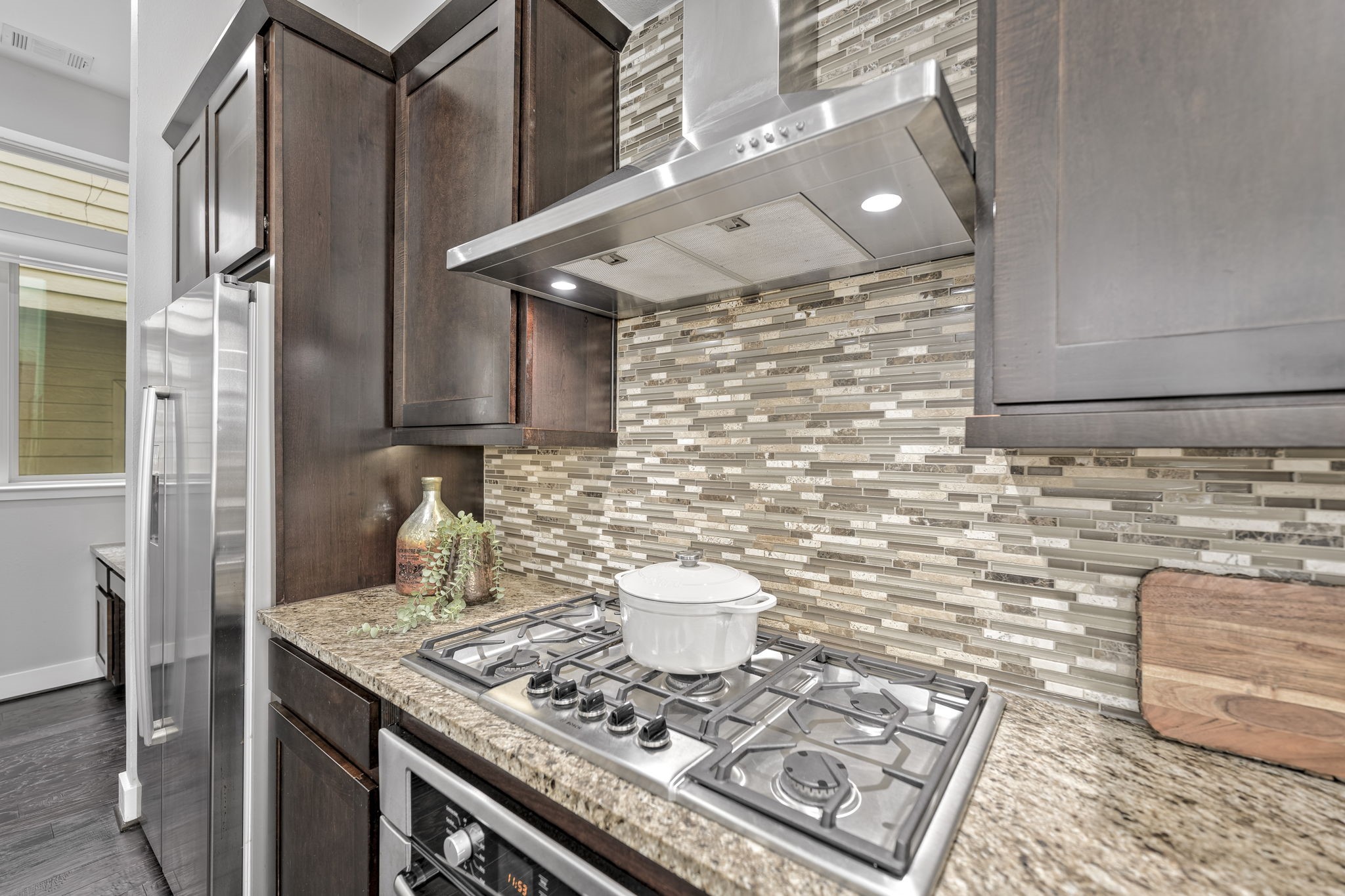 4408 Eli Street, Unit C Houston, TX 77007 - Photo 13 of 48 a kitchen with a stove and a shower