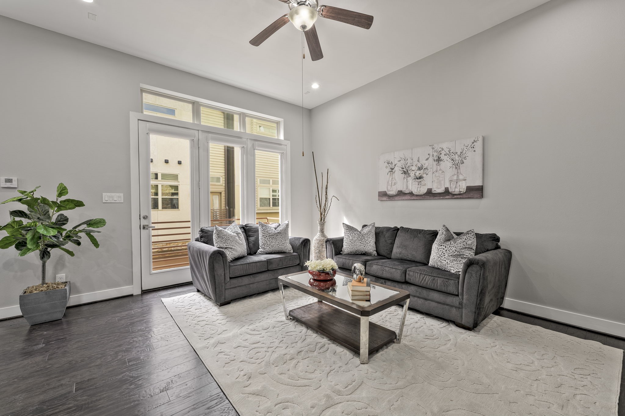 4408 Eli Street, Unit C Houston, TX 77007 - Photo 16 of 48 a living room with furniture and a large window