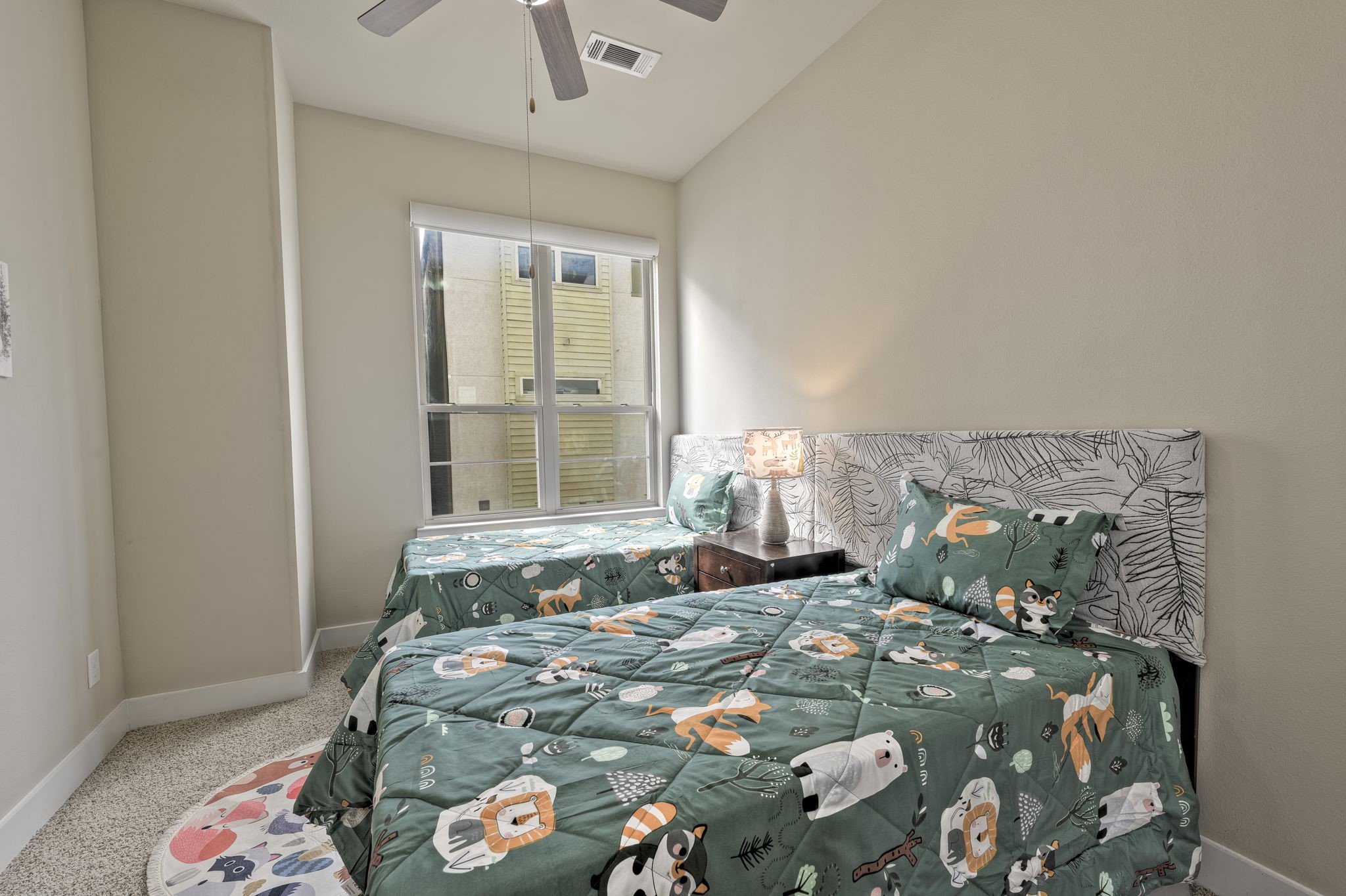 4408 Eli Street, Unit C Houston, TX 77007 - Photo 19 of 48 a bedroom with a bed and window