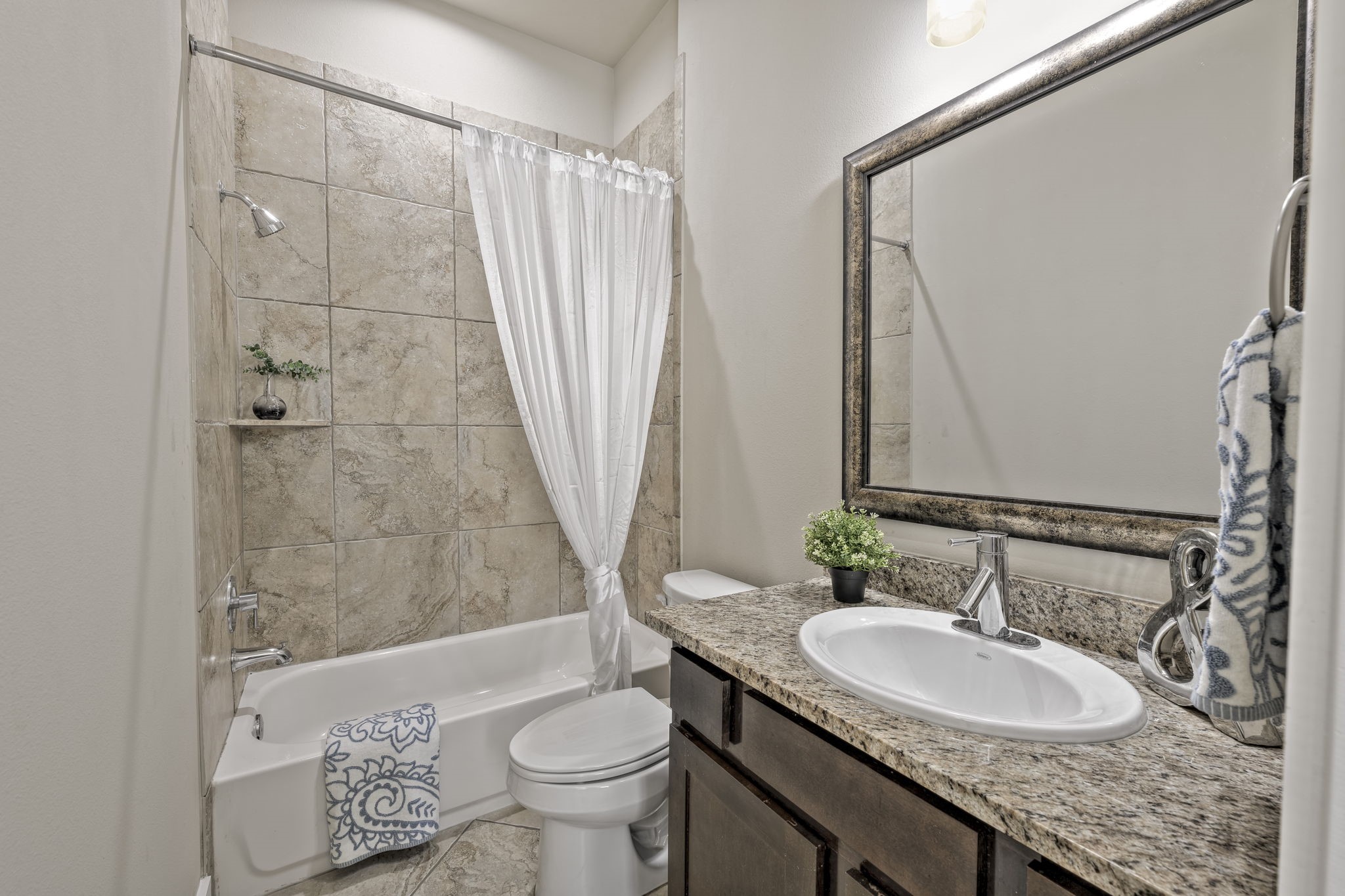 4408 Eli Street, Unit C Houston, TX 77007 - Photo 20 of 48 a bathroom with a granite countertop sink toilet and shower