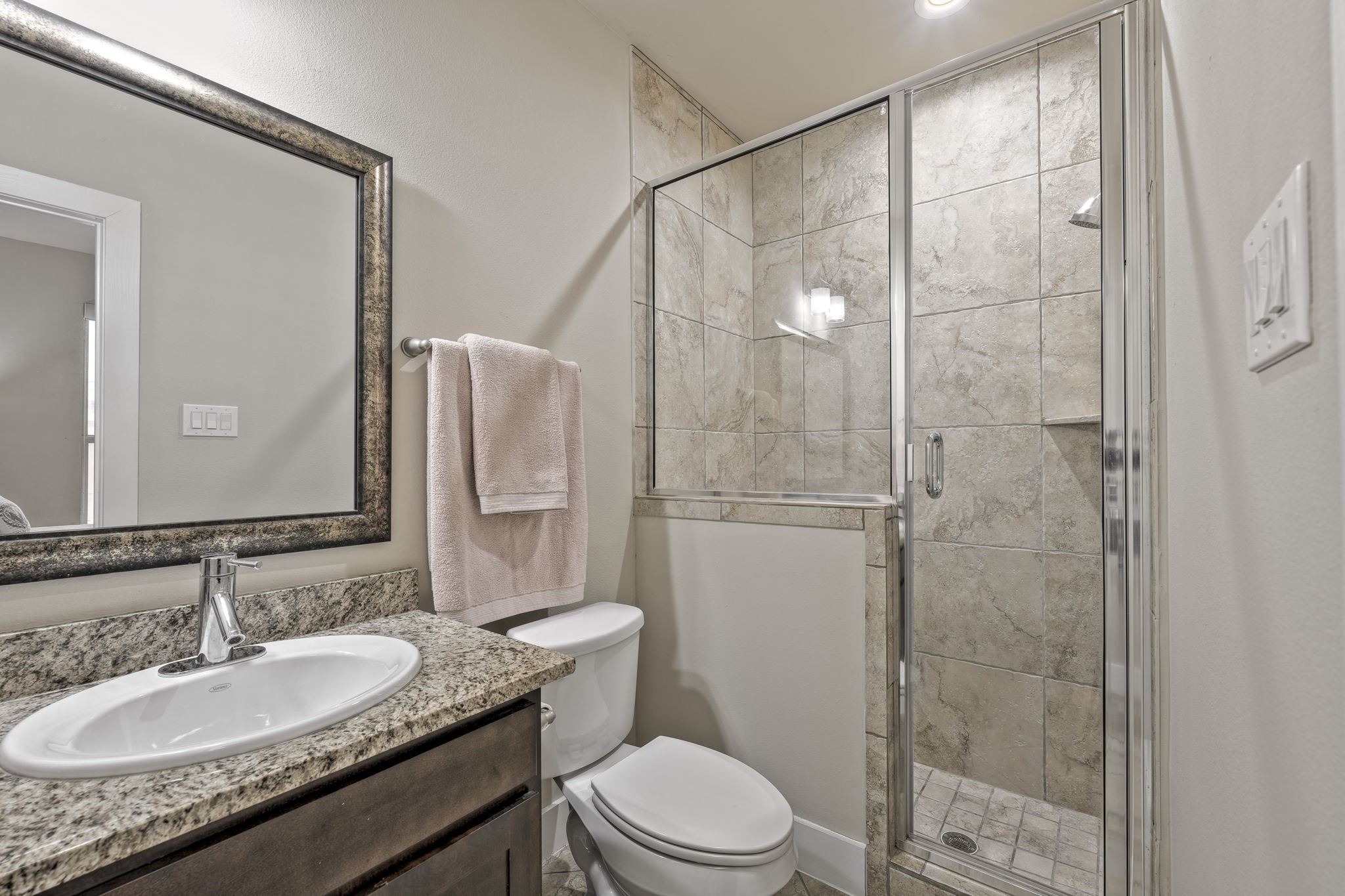 4408 Eli Street, Unit C Houston, TX 77007 - Photo 4 of 48 a bathroom with a granite countertop sink toilet and shower