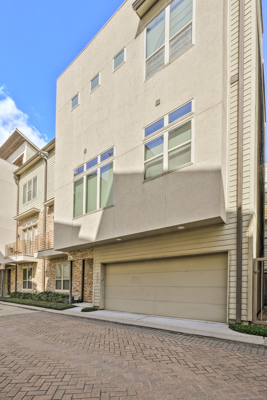 4408 Eli Street, Unit C Houston, TX 77007 - Photo 43 of 48 a front view of a building with a street