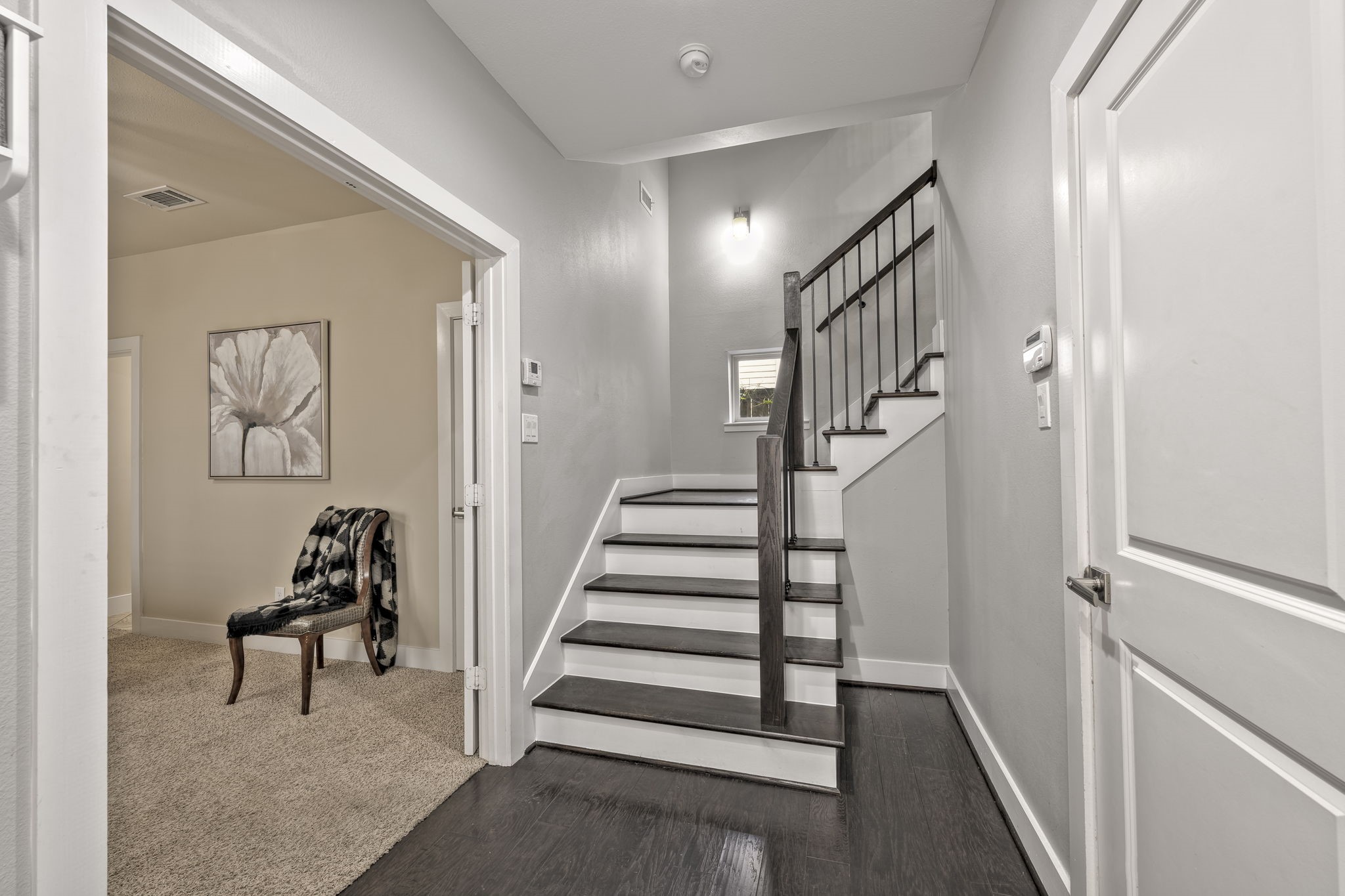 4408 Eli Street, Unit C Houston, TX 77007 - Photo 6 of 48 a view of entryway with hardwood and stairs