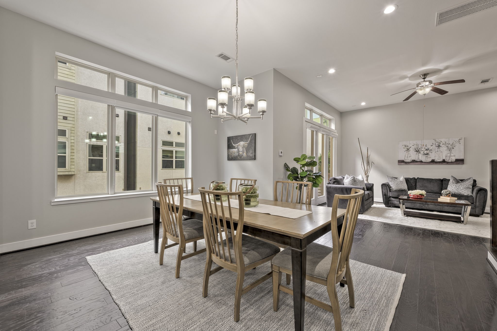 4408 Eli Street, Unit C Houston, TX 77007 - Photo 10 of 48 a view of a dining room with furniture and wooden floor