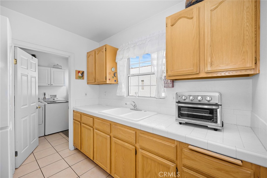 2306 Alhambra Road Alhambra, CA 91801 - Photo 16 of 29 a kitchen with a sink and cabinets